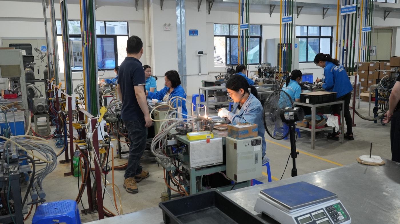 BIOSUN technicians assembling UV lamp products